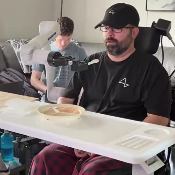 NEURALINK ENABLED A PARALYZED MAN TO CONTROL A ROBOTIC ARM AND FEED HIMSELF USING ONLY HIS THOUGHTS