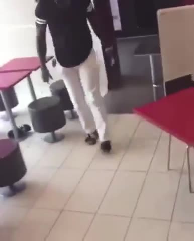 A fine dining experience featuring black people and a machete