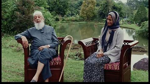 Sh. Imran Hosein - With my grand daughter, Amira, in Jandabaik, Malaysia The Qur'an and Sacred Time!