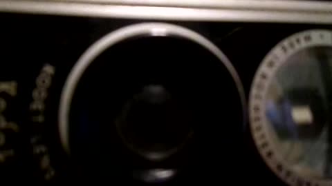 My old Samsung camera filming old photos on the Kodak Duaflex camera!