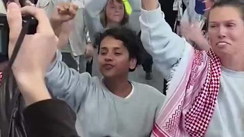 Greta Thunberg jumps up and down and cheers as she arrives back in Sweden.