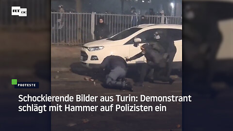 Schockierende Bilder aus Turin: Demonstrant schlägt mit Hammer auf Polizisten ein