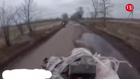 Russian carry their dead and wounded
