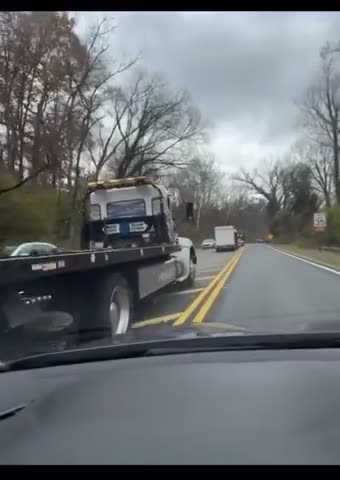A large number of vehicles can be seen waiting to be towed after ICE arrest illegals