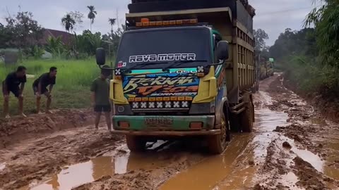 the charm of a truck shaking on an extreme road