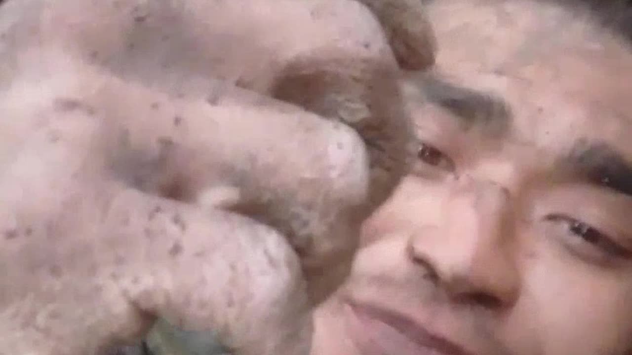 Russian Soldier Rotting Inside of a Muddy Hole for Two Days Now