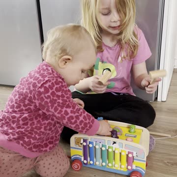 Baby Kayla Checking Out Her Christmas Toys