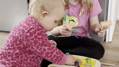 Baby Kayla Checking Out Her Christmas Toys
