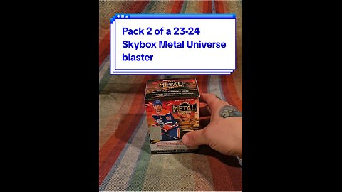 Pack 2 of a 2023-24 Skybox Metal Universe blaster