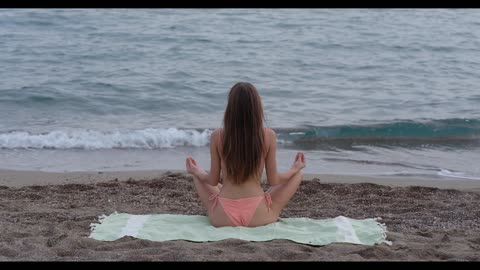 Yoga meditation by the sea