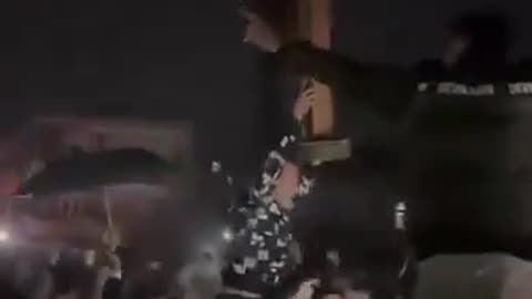 Syrian Christians Raise A Cross Where A Christmas Tree Burned