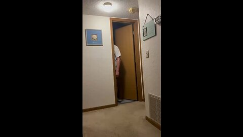 Brother falls asleep drunk against bathroom doorframe