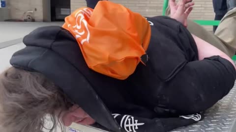 Portland ICE Protester Has to Be Dragged Away on Hand Cart