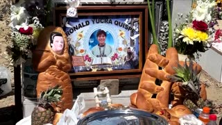 Bolivian cemetery bursts with life on Day of the Dead