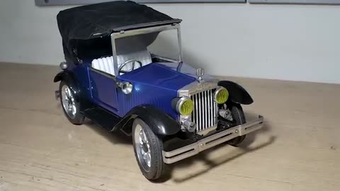 Restoration of an old toy car Phaeton