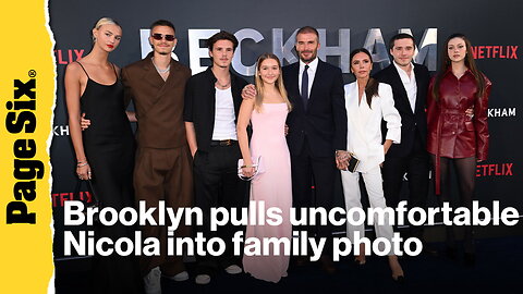 Red carpet video shows Brooklyn Beckham pull uncomfortable Nicola Peltz into family photo