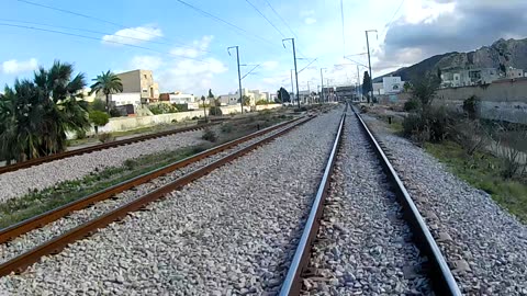 Train surfing on Tunis suburban train in Tunisia