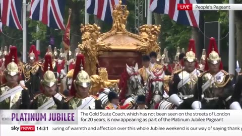 A hologram of the Queen drove through London, and people waved at it