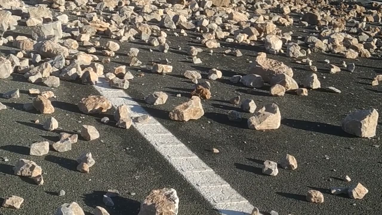 Cleaning Up After Truck Loaded With Stones Overturned