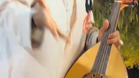 The imam is very angry and destroying musical instruments because they...