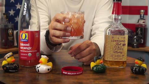 L Carl Davis - Lonehand Hot Honey Whiskey & Organics Blood Orange Soda