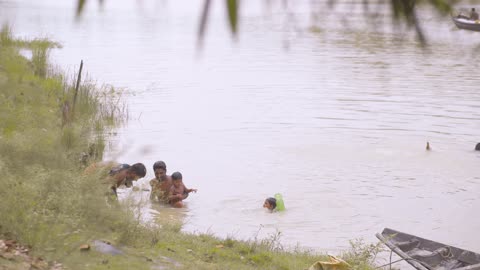 Joyful Children Bathing and Playing Happily in the River | Heartwarming Moments