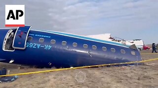 Kazakhstan plane crash: Bodycam video shows emergency services arriving at site