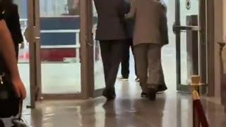 Sen Mitch McConnell led to the Senate floor