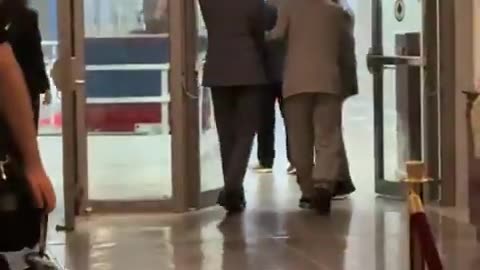 Sen Mitch McConnell led to the Senate floor