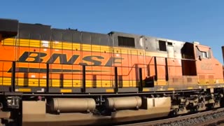 Motorcycle backflip over a moving train