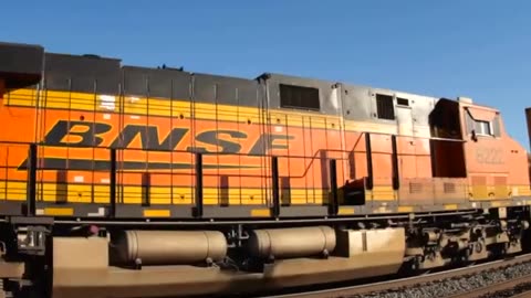 Motorcycle backflip over a moving train