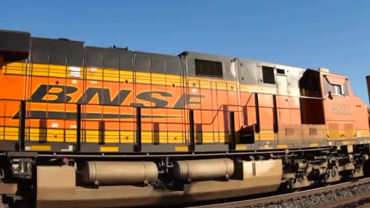 Motorcycle backflip over a moving train
