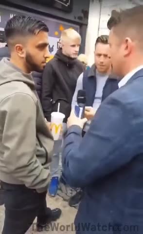 Pakistani migrant attacks Tommy Robinson and is quickly educated by British patriots