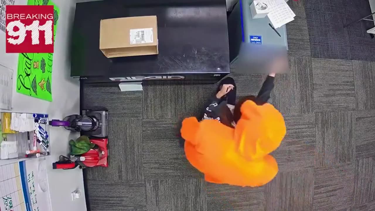 a robber armed with a knife assaulting a female employee of a store in Glendale, Arizona.