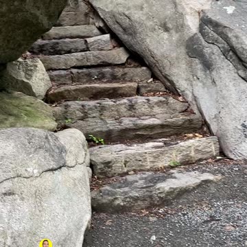 STEPS THROUGH A ROCK PASSAGEWAY