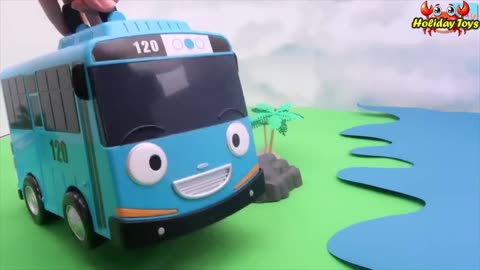 Blue Bus Playing with Yellow Boat on the Edge of Lake