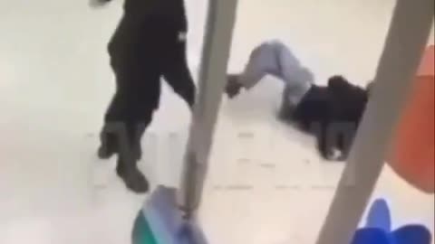 Dude Sucker Punches a Security Guard and Then Gets Eliminated With a Vicious Spinning Kick