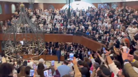 A man who just committed a Genocide is being welcomed as a “hero” at a synagogue in Miami, Florida. | Nit to mention he is helping to dismantle America. Keep cheering treasonous pos!