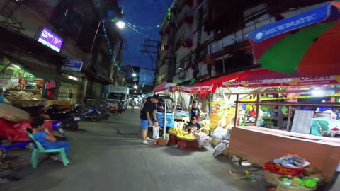 Playful Kids Along Elcano Street in Manila City in the Philippines