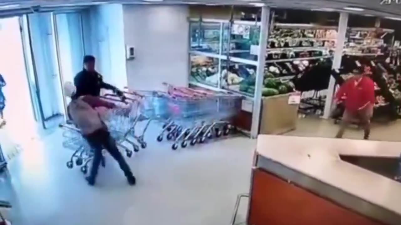 Store employee knocks out fleeing shoplifter by throw a Coke bottle at his head.