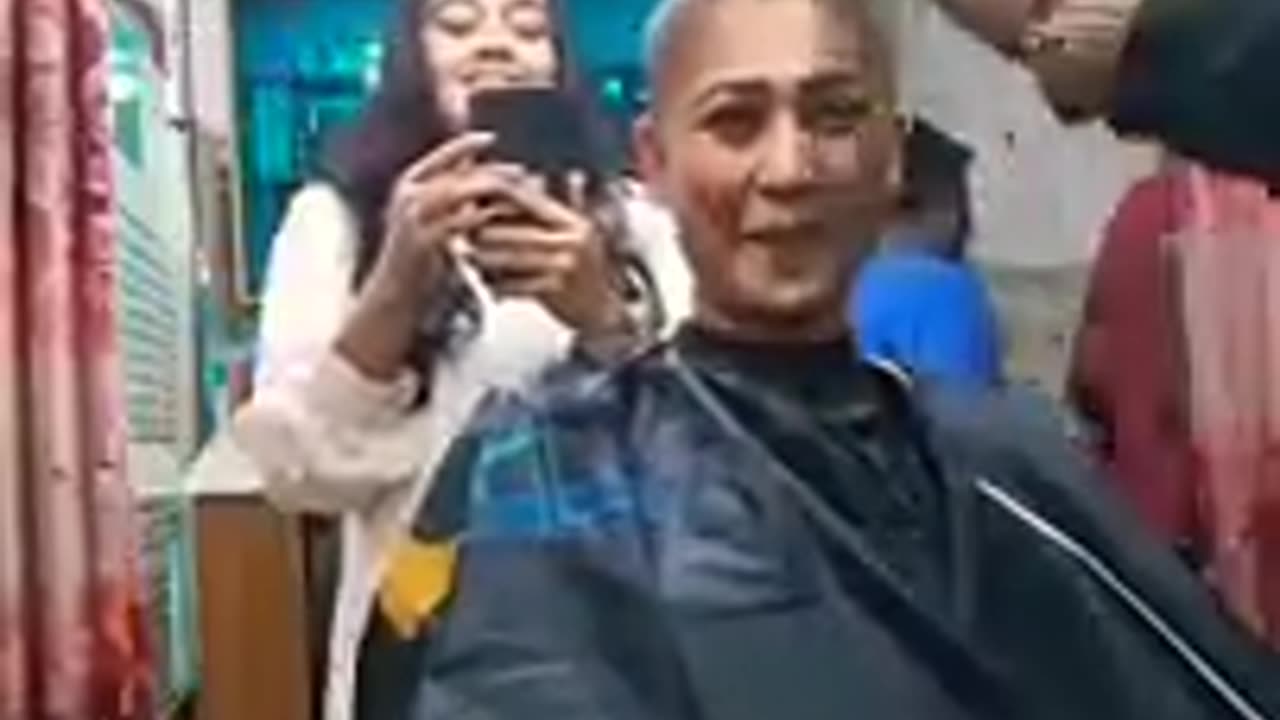 Headshave woman