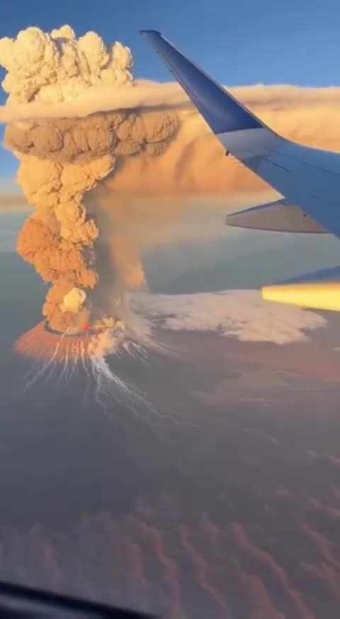 Incredible footage of volcanic eruption of a dormant volcano in Ethiopia from a commercial plane.