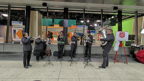 Holiday Cheer in the Windy City: Brass Band Plays Christmas Classic in Chicago