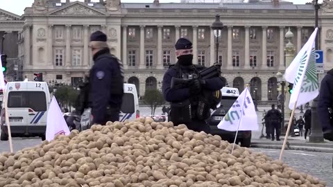 Farmers protesting EU-Mercosur deal dump potatoes on Paris bridge