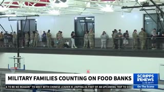 A food bank lined up with military members