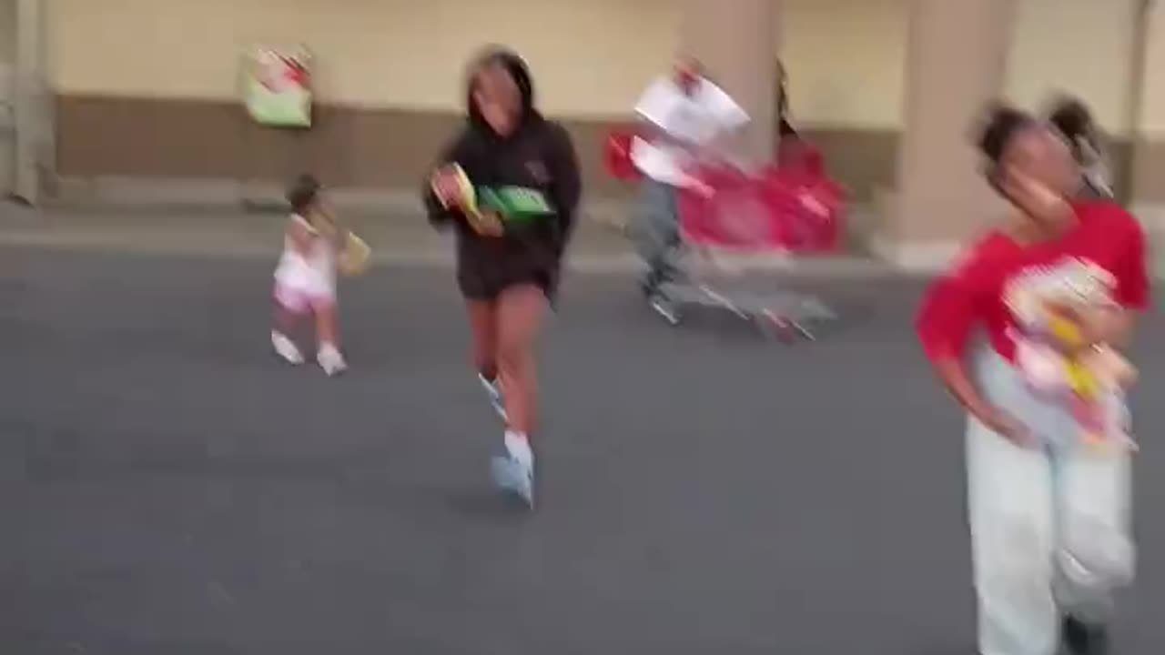 Her entire family running out of the store after they stole products.