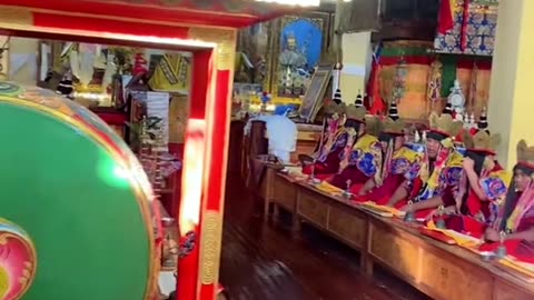 The monks are praying for all people for good or blessing.