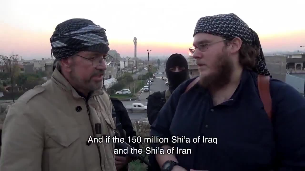 A corpulent German radical in Syria declares that all non-believers and “heretics”