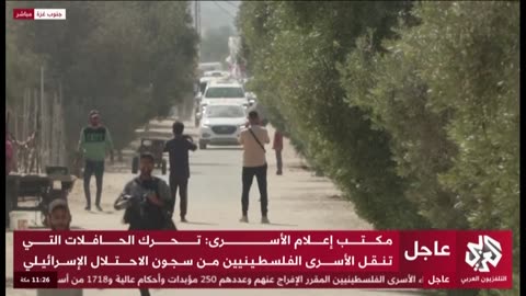 Red Cross vehicles on their way to the transfer point, with the kidnapped people.