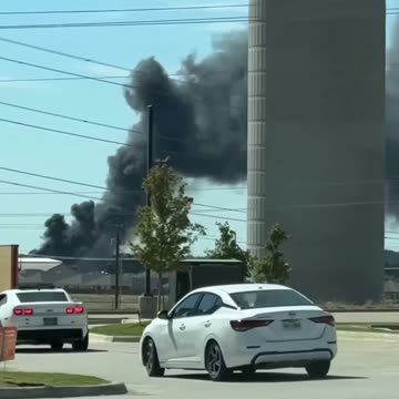 A plane crashed in Fort Worth, Texas, and several vehicles caught fire.